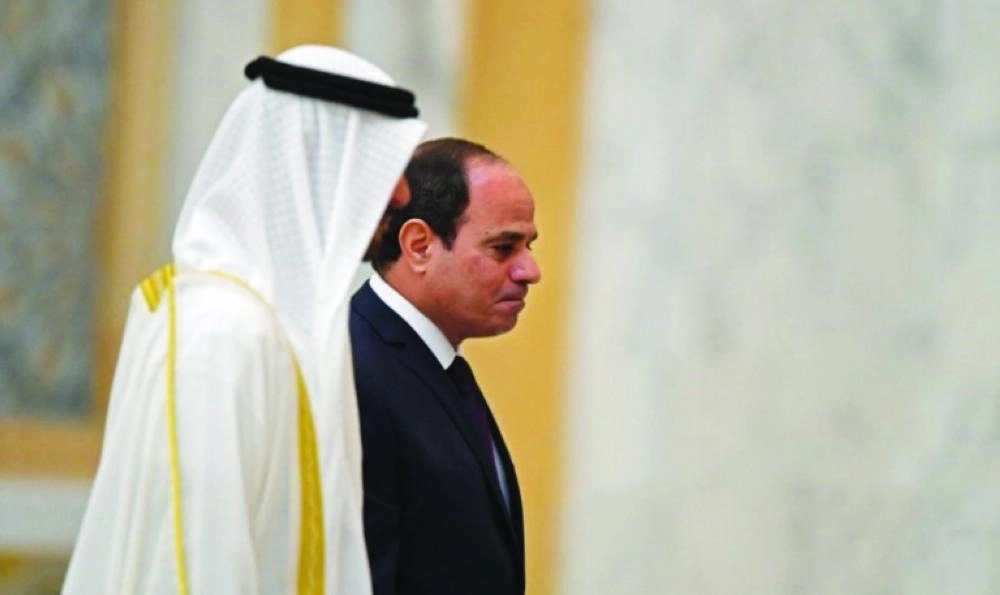 الرئيس السيسي وولي عهد الإمارات في أبوظبي (أ ف ب)