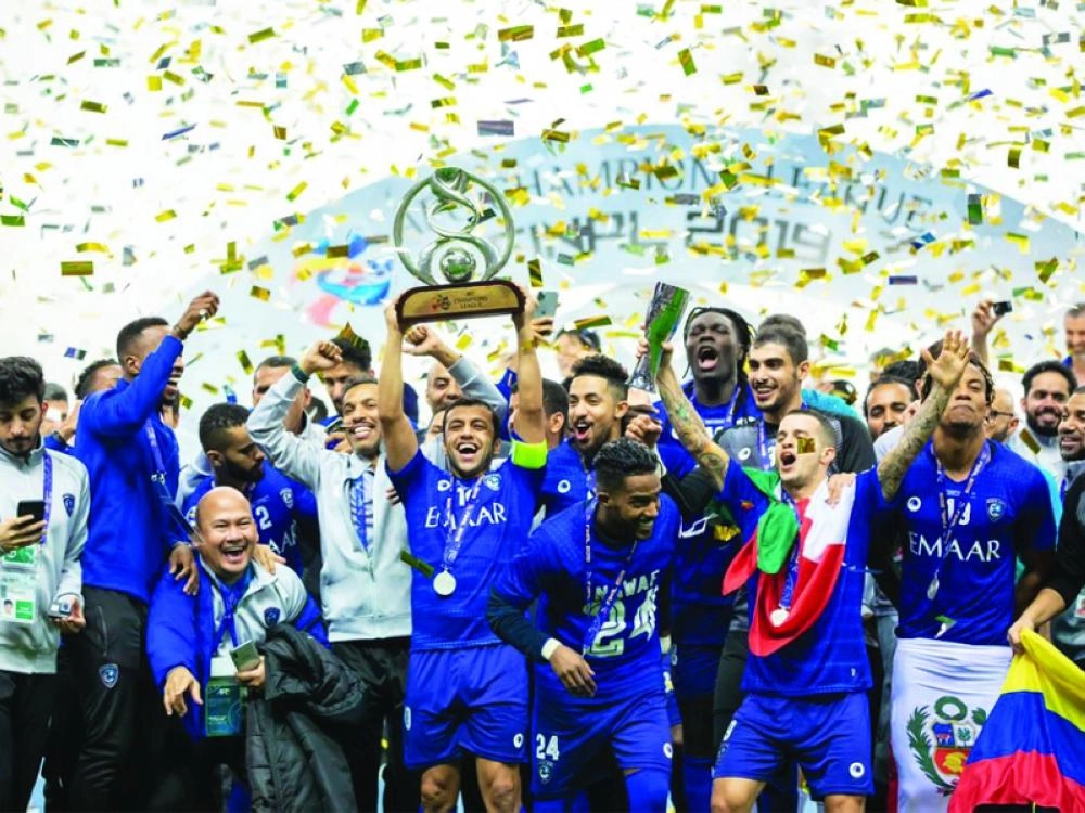 تتويج الهلال بطلا لدوري أبطال آسيا أمس في اليابان  (مكة)