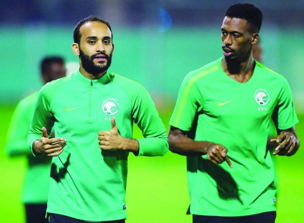 كنو وعطيف خلال تدريب للأخضر في خليجي 24                                                          (مكة)