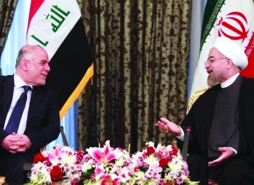 رئيس الوزراء العراقي حيدر العبادي والرئيس الإيراني حسن روحاني (مكة)