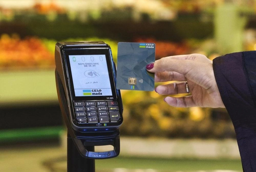 أثناء إجراء عملية عبر نقاط البيع                                        (مكة)