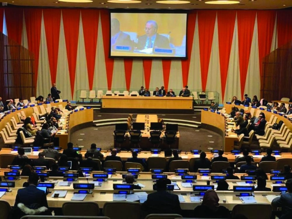 



المعلمي خلال حديثه في الأمم المتحدة      (مجموعة العشرين)