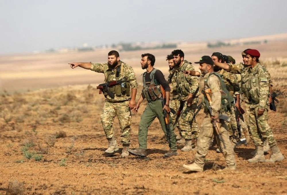 






عناصر من المرتزقة التابعين لسوريا                                                            (مكة)