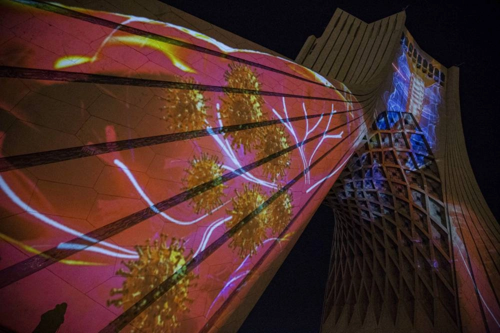 






صورة فيروس كورونا تظهر على البرج                                       (د ب أ)