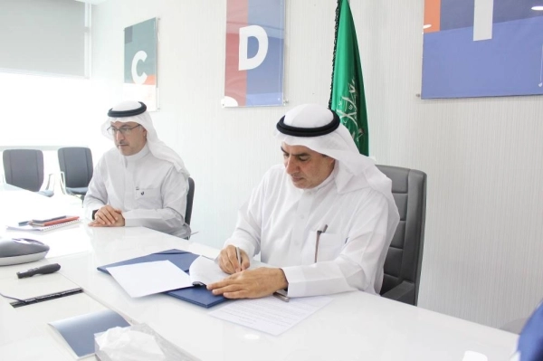 جانب من توقيع الاتفاقية (مكة)