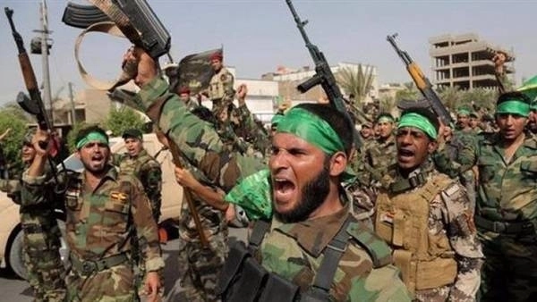 






عناصر من ميليشيات عراقية موالية لإيران                                                                            (مكة)