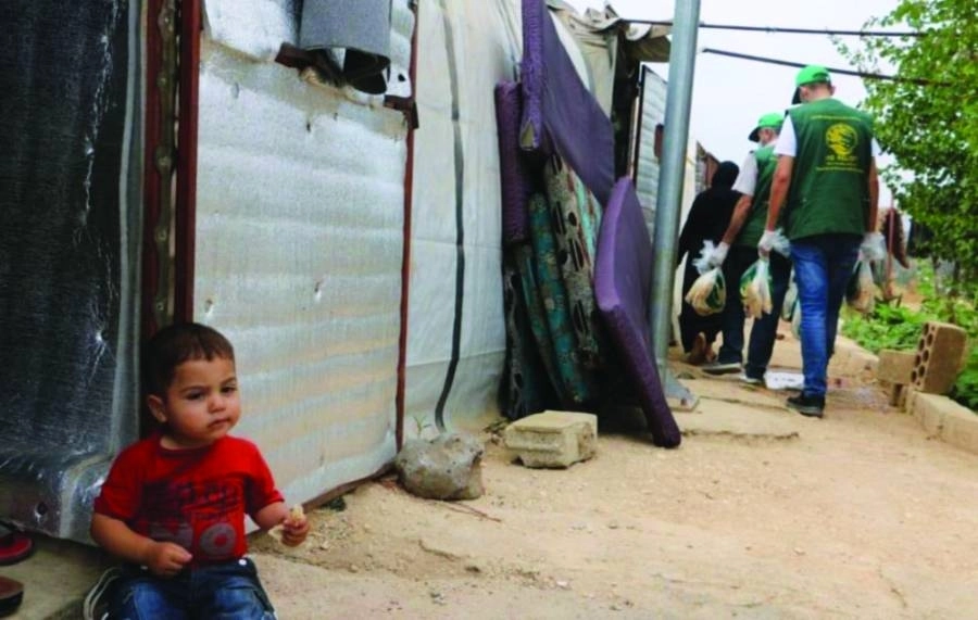 






فريق المركز يوزع الخبز                  (واس)