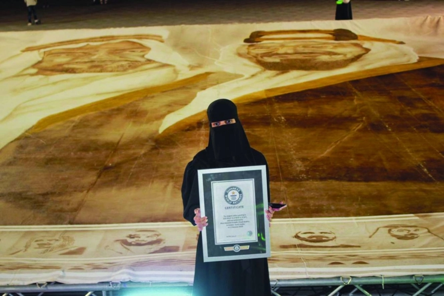 عهود المالكي تحمل شهادة تسجيلها بغينيس (مكة)