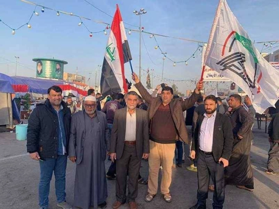 






ميليشيات عراقية ترفع علم الحشد الشعبي                           (مكة)