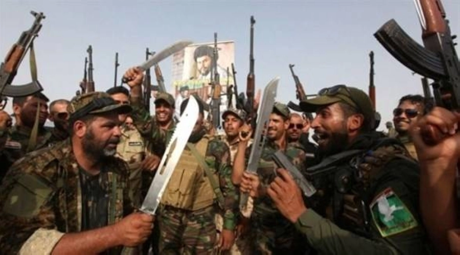 ميليشيات ترفع الأسلحة في شوارع بغداد                                                                            (مكة)