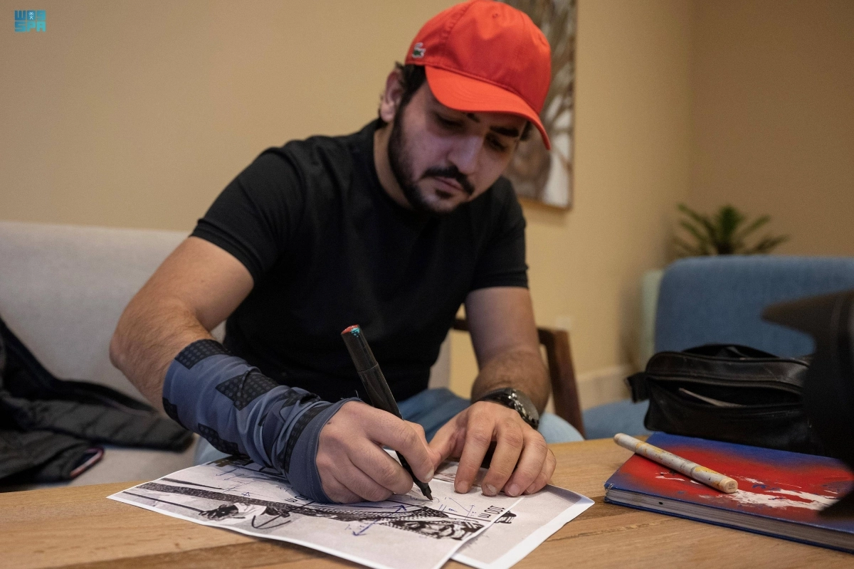  العمار خلال رسم اللوحة الجدارية (مكة)