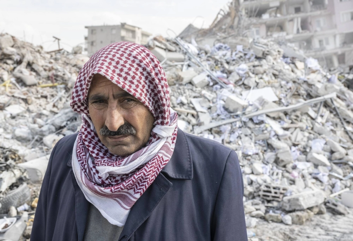 

الألم يرتسم على وجه مواطن سوري                               (د ب أ)