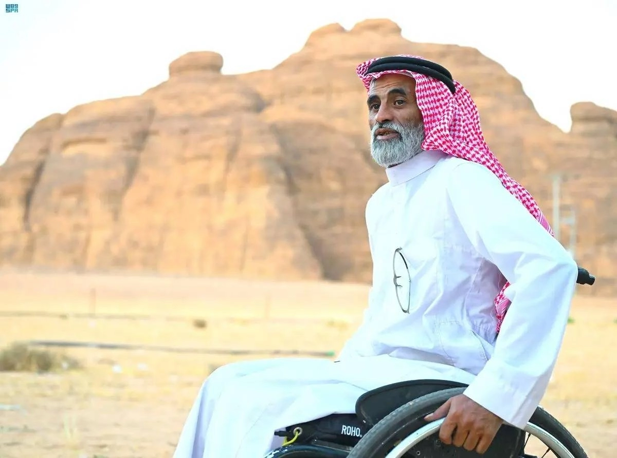 الكرسي المتحرك لم يعقه عن تحقيق حلمه (مكة)