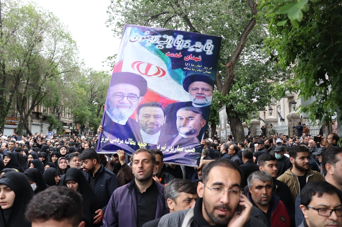 


جانب من تشييع جنازة رئيسي                                     (د ب أ) 