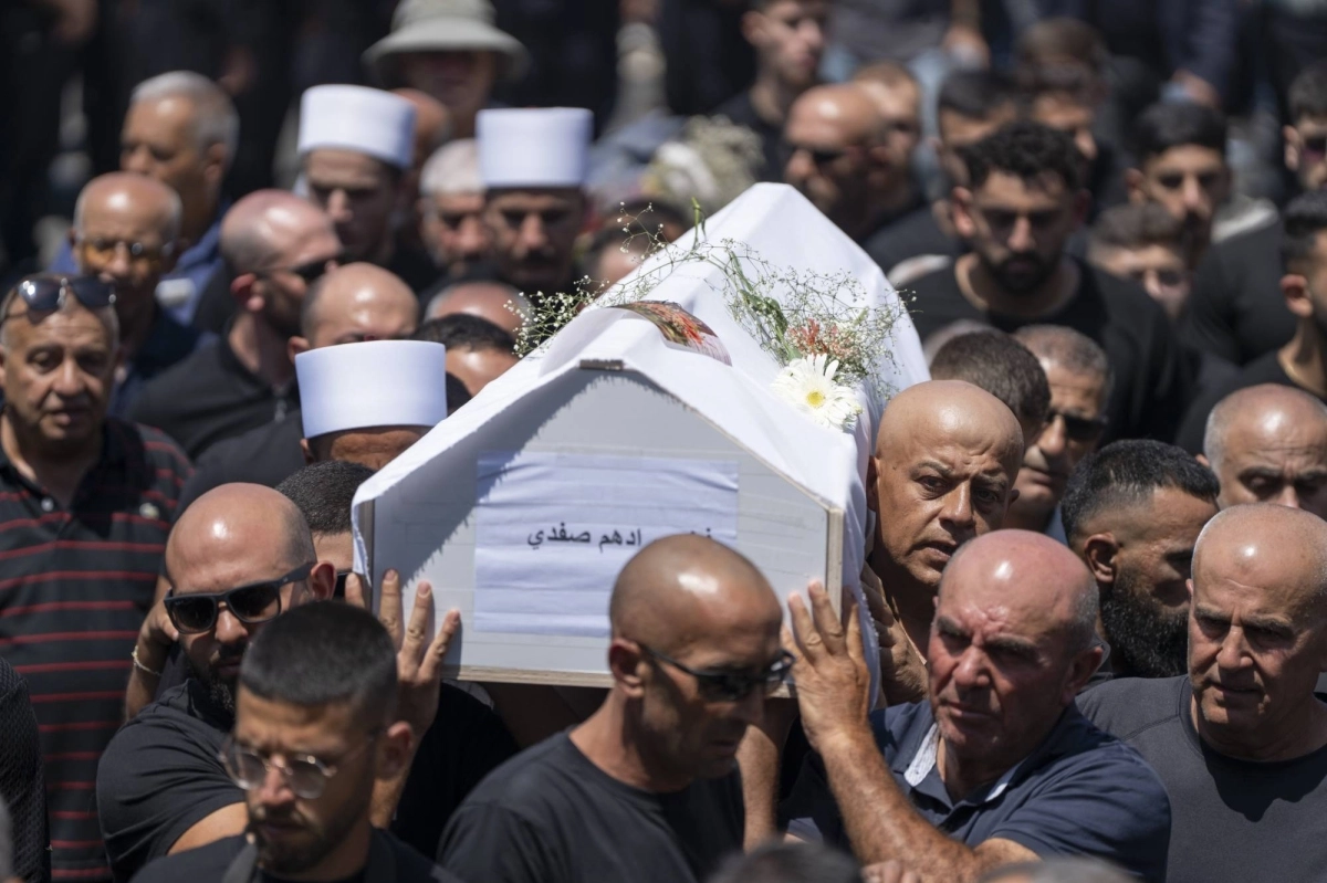 


تشييع جنازة شباب وأطفال مجدل شمس بالجولان                                      (د ب أ) 