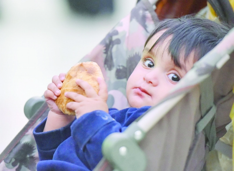 طفل في مهرجان الكليجا (واس)