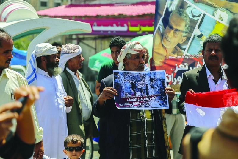 تنديد بجرائم الحوثيين في تظاهرة بتعز (أ ف ب)