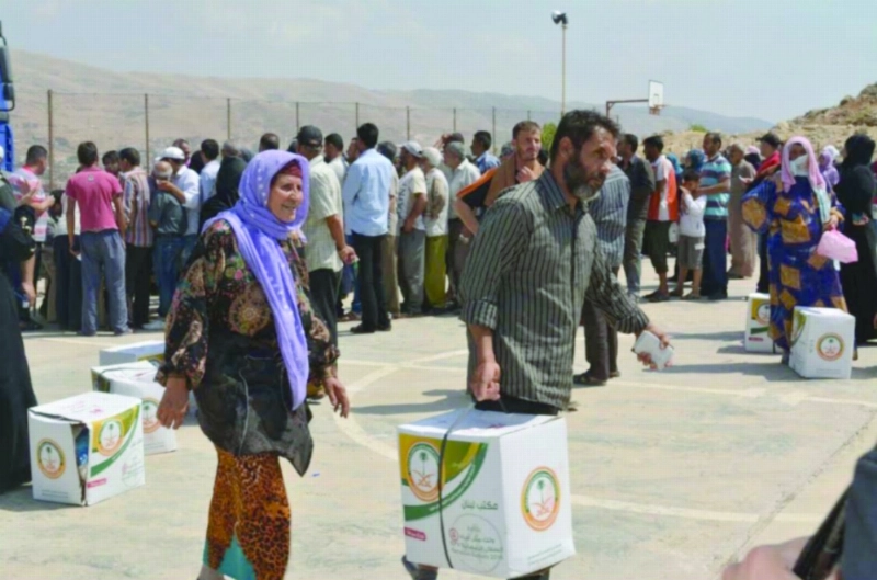 مساعدات غذائية سعودية للاجئين السوريين (واس)