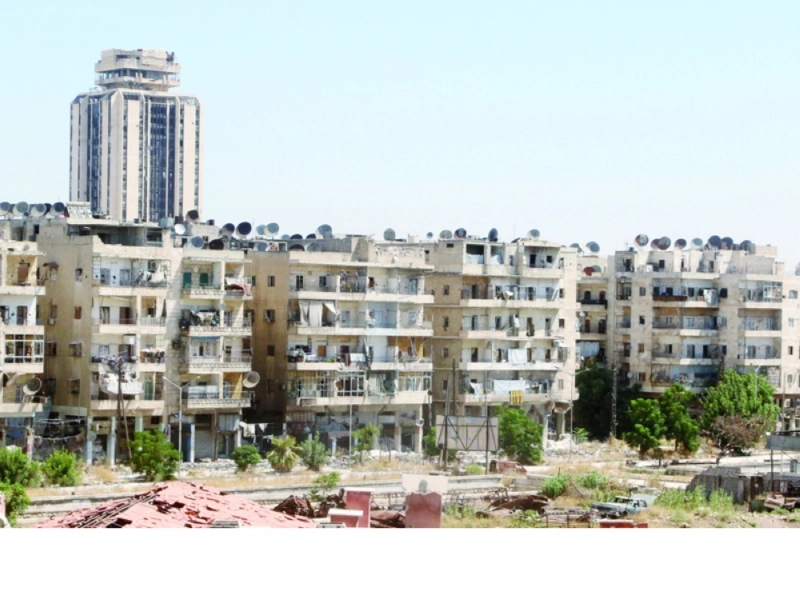 ممر لخروج المدنيين من معبر باب القصر في حلب (رويترز)