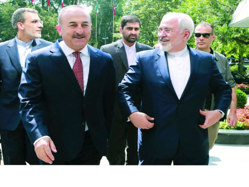 وزيرا خارجية تركيا وإيران في أنقرة أمس (أ ف ب)