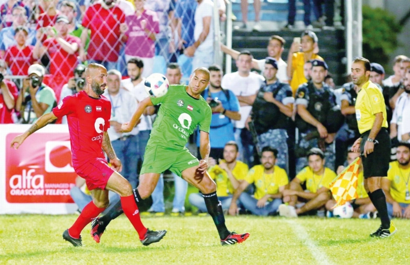 تريزيجيه خلال ودية نجوم العالم ولبنان (إ ب أ)
