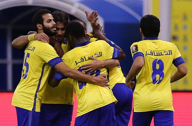 فرحة لاعبي النصر بالهدف الوحيد (إ ب أ)