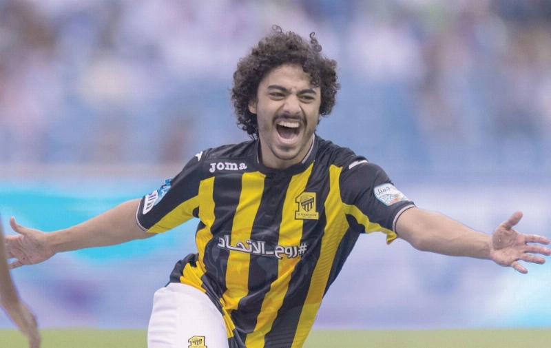 عبدالعزيز العرياني يحتفل بالهدف الثاني في مرمى الهلال (إ ب أ)