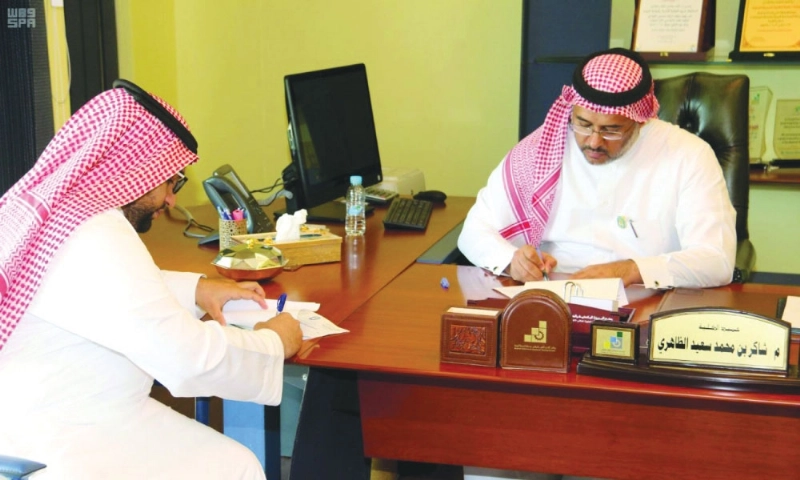 من توقيع الاتفاقية (مكة)