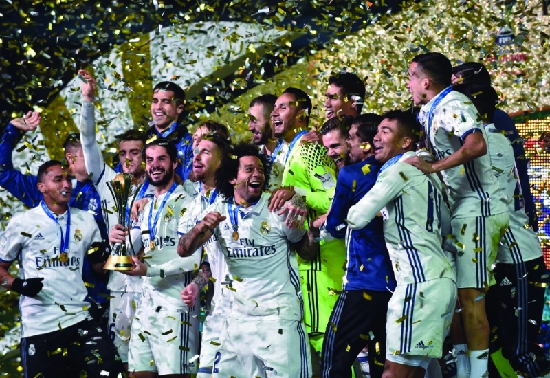ريال مدريد يحتفل بكأس العالم للأندية (أ ف ب)