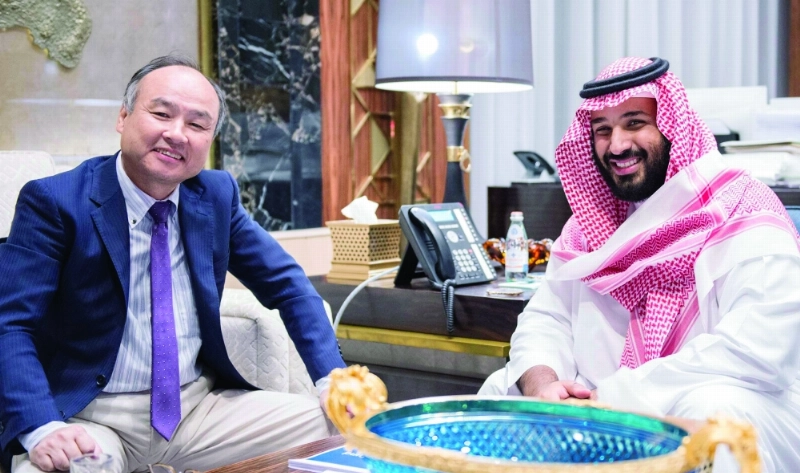 ولي ولي العهد ورئيس مجلس إدارة سوفت بنك في لقاء سابق (مكة)