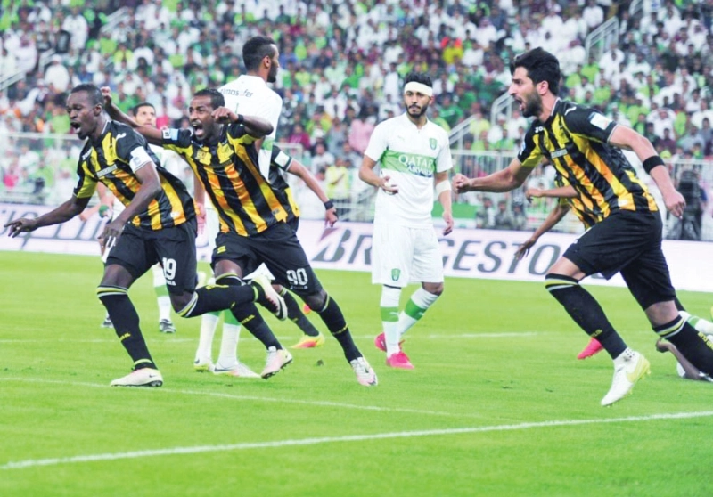 لاعبو الاتحاد عقب هدف عدنان فلاتة (محمد يحيى)