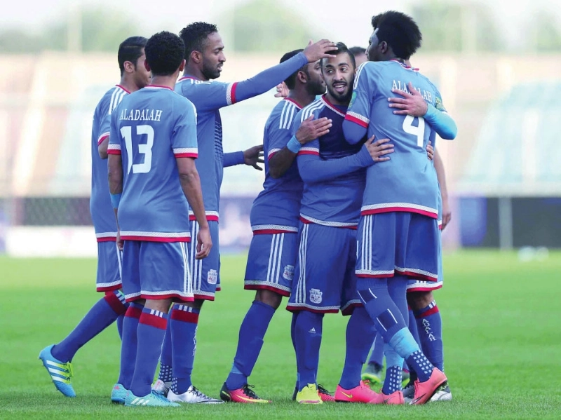 فرحة لاعبي العدالة بالتأهل أمس (إ ب أ)