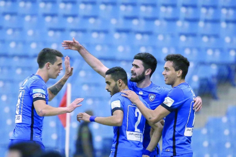 فرحة لاعبي الهلال بحسم لقب الدوري (إ ب أ)