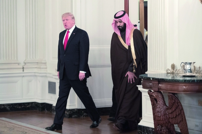 ولي ولي العهد وترمب في البيت الأبيض أمس الأول (إ ب أ)