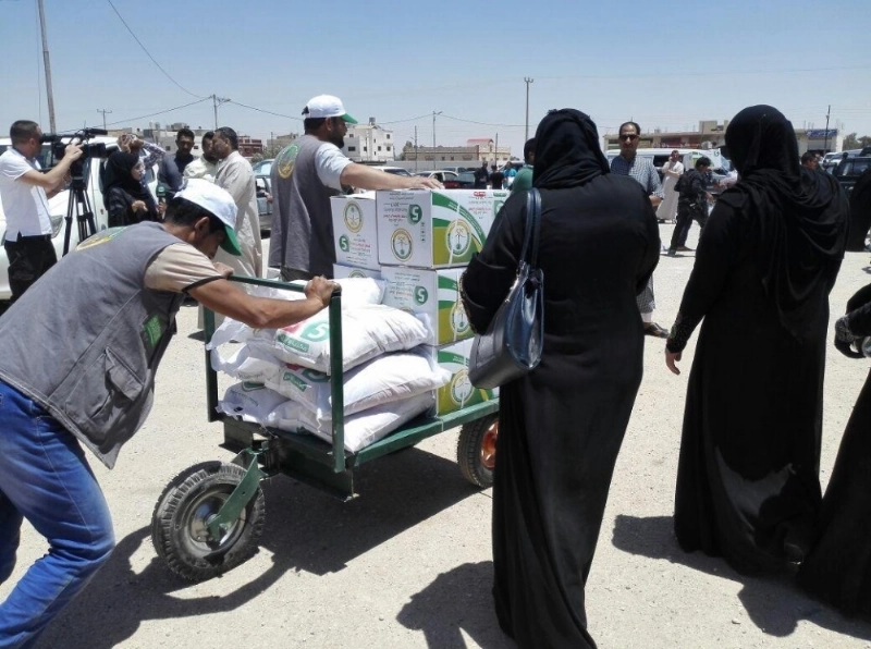 مساعدات من الحملة الوطنية السعودية للسوريين بالأردن (واس)