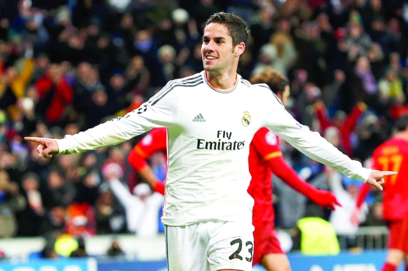 Real Madrid's "Isco" celebrates after scoring a goal against Galatasaray during their Champions League soccer match in Madrid