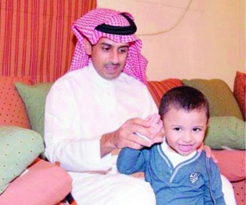 طارق العلاقي وأحد أبنائه