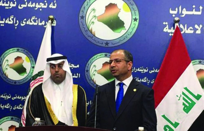 السلمي والجبوري في مؤتمر صحفي ببغداد أمس (واع)