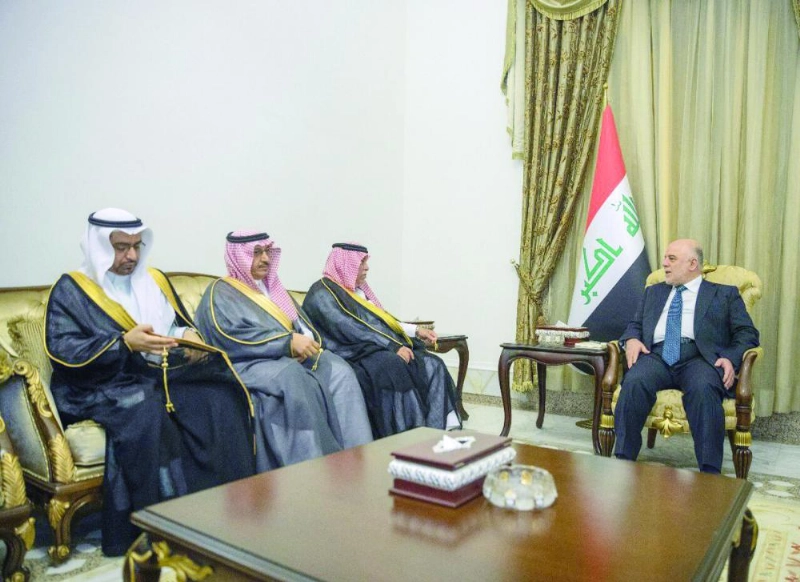 العبادي أثناء استقبال القصبي والوفد المرافق (تويتر)