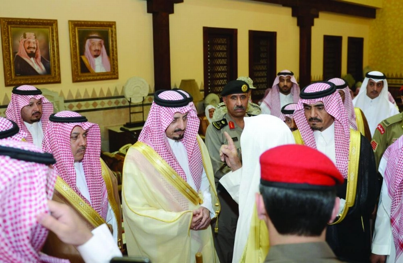 فيصل بن خالد مستقبلا المعزين في شهداء منطقة عسير (واس)