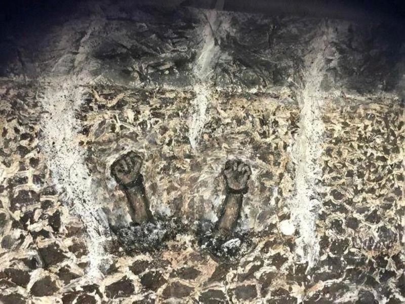 لوحة تصف ما واجهه رباني من تعذيب (إنديبندنت)