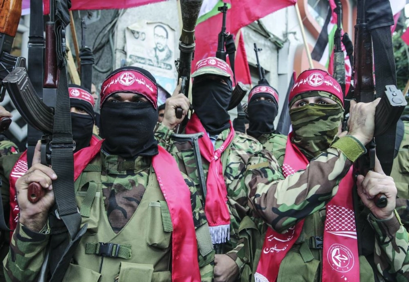 dpatop - Palestinian militants of the Popular Front for the Liberation of Palestine (PFLP) participate in a protest in Gaza City, Gaza, 07 December 2017. Trump's recognition of Jerusalem as the capital of Israel has drawn widespread international condemnation and anger. Photo: Wissam Nassar/dpa