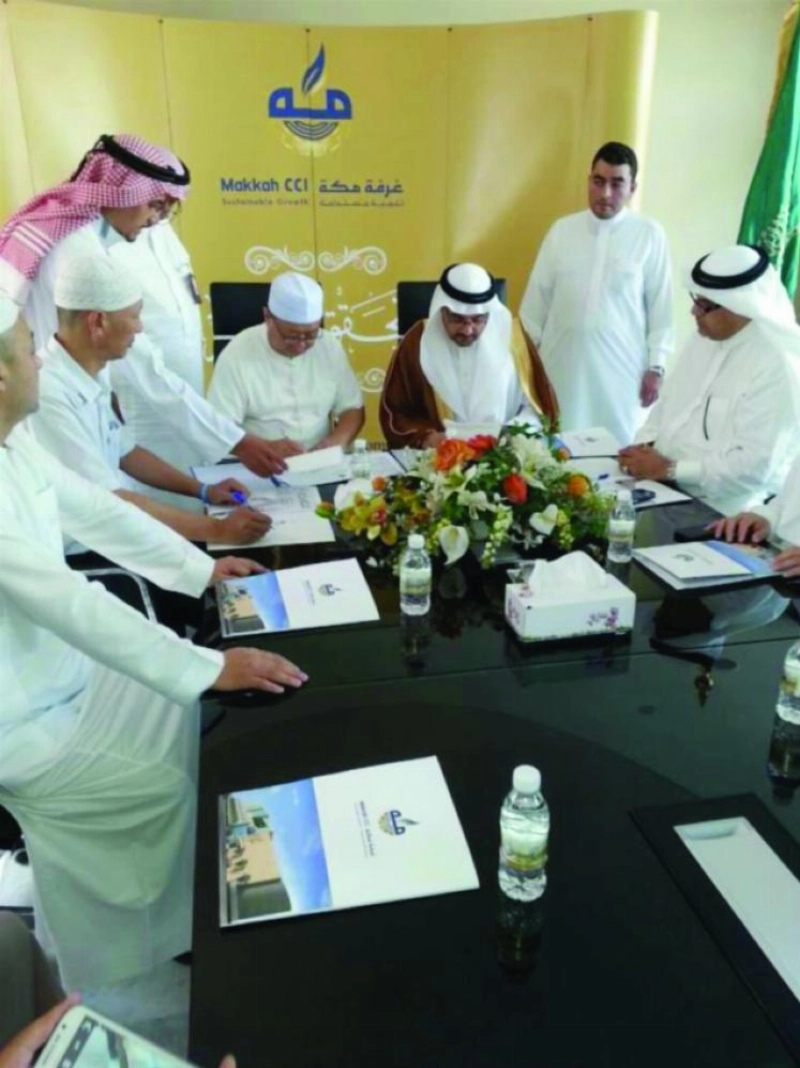 من توقيع المذكرة مع الغرفة التجارية لمنشآت المسلمين بسيان الصينية