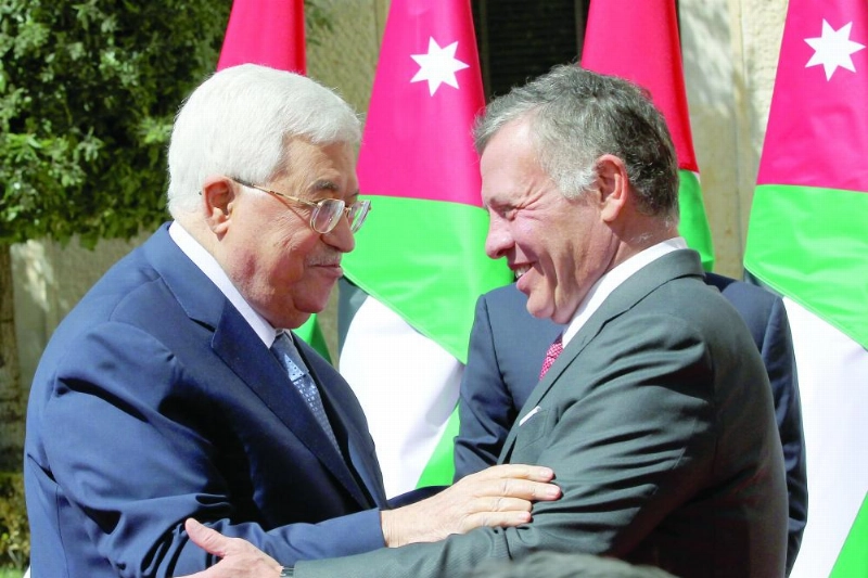 ملك الأردن خلال استقباله الرئيس الفلسطيني محمود عباس (د ب أ)