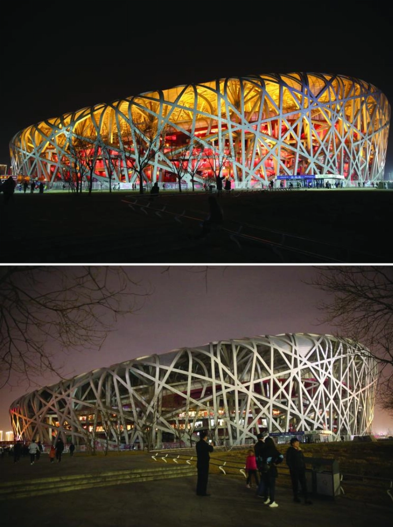 epa06626449 A composite photo shows the National Stadium (Bird's Nest) before (top) and during (below) Earth Hour in Beijing, China, 24 March 2018. Many landmark buildings across China switched off their lights for one hour to take part in the Earth Hour movement as a sign of their commitment to the planet. Earth Hour is an annual event in which lights are switched off in major cities around the world to draw attention to energy consumption and its environmental effects. EPA/WU HONG