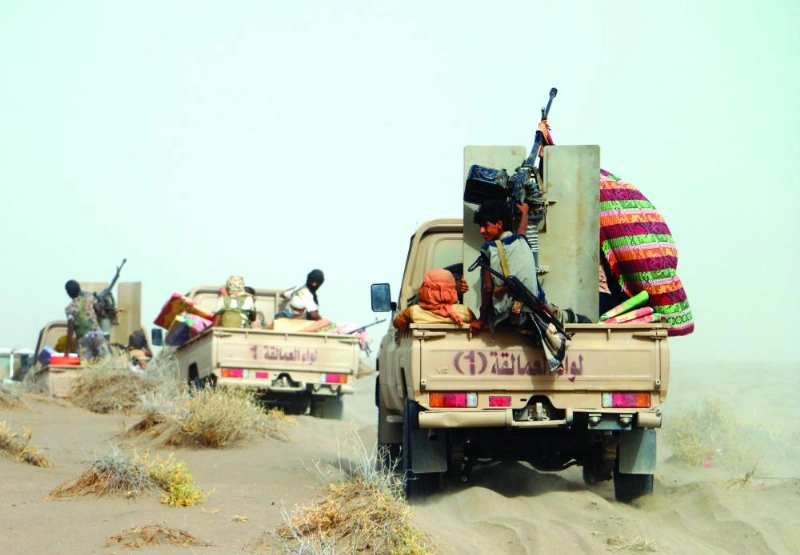 epa06868474 Yemeni government forces backed by the Saudi-led coalition take position during an attack on the port city of Hodeidah, on the outskirts of Hodeidah, Yemen, 05 July 2018 (Issued 06 July 2018). According to reports, Yemeni government forces backed by the Saudi-led coalition continue a military offensive to retake the port city of Hodeidah from the Houthi rebels. EPA/NAJEEB ALMAHBOOBI