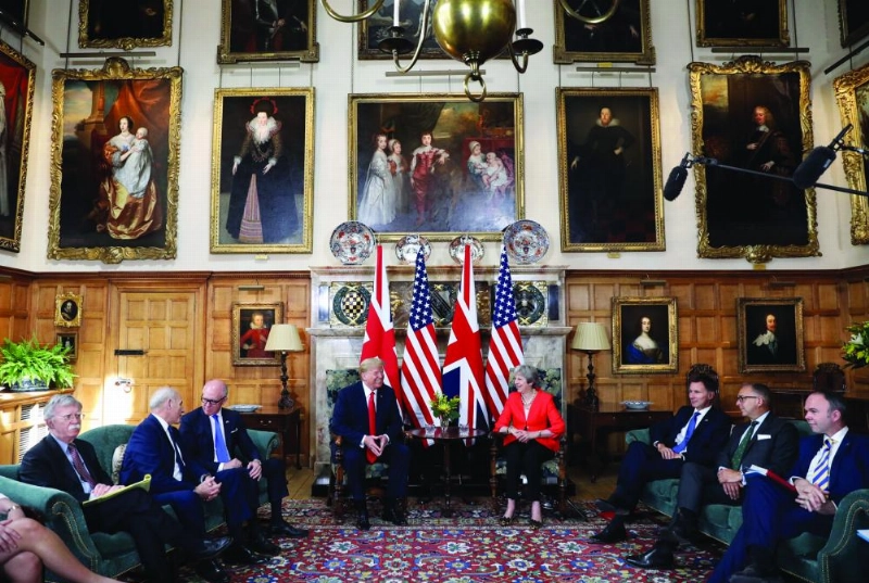 epa06885348 British Prime Minister Theresa May (C-R), US President Donald J. Trump (C-L), US national security advisor John Bolton (L), US ambassador to the United Kingdom Woody Johnson (3-L), British Foreign Secretary Jeremy Hunt (3-R) and Downing Street Chief of Staff Gavin Barwell at the start of the bilateral meeting at Chequers in Aylesbury, Britain, 13 July 2018. US President Trump is on a three-day working visit to the United Kingdom, first trip to the country as US president. EPA/CHRIS RATCLIFFE / POOL
