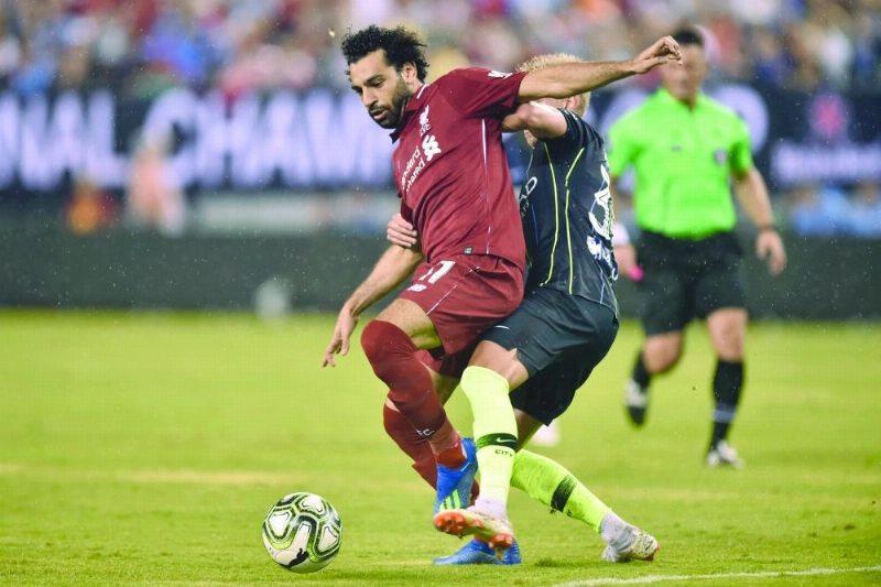 محمد صلاح خلال مباراة ليفربول ومانشستر يونايتد (د ب أ)