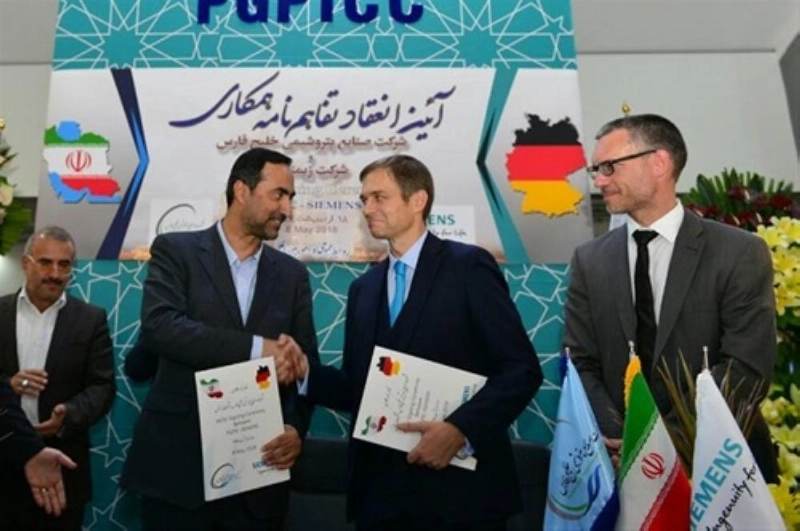 الرئيس التنفيذي لشركة PGPIC الإيرانية خلال توقيع مذكرة مع سيمنز