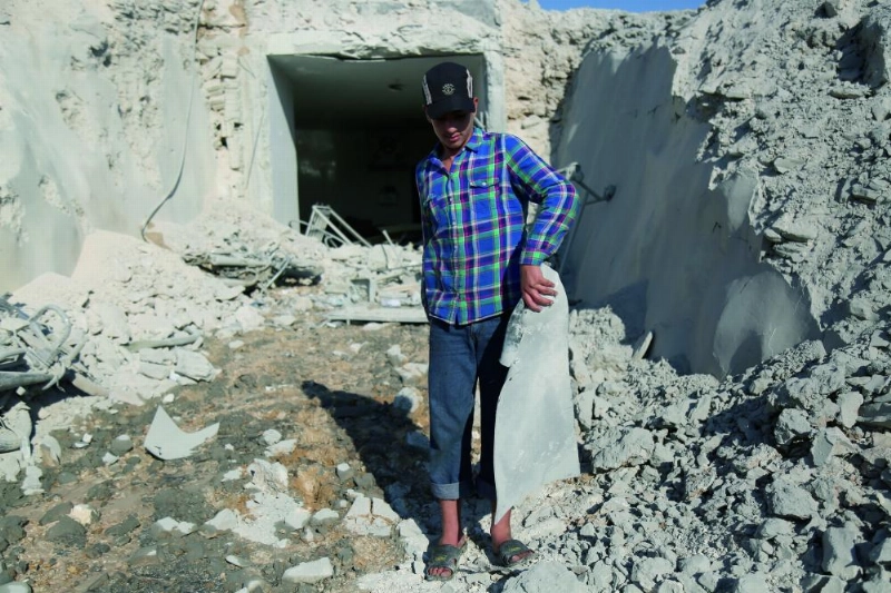 A Syrian inspects the wreckage at a site after Syrian government airstrikes, which targeted the civilian hospital with several missiles in the town of Hass, Rural Idlib Alhnobi, Syria, 08 September 2018. Photo: Anas ALkharboutli/dpa